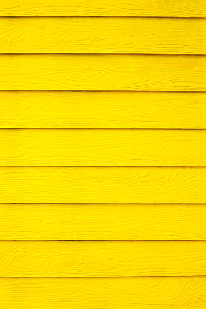 istock Detail of yellow plank timbered wall 2218453605