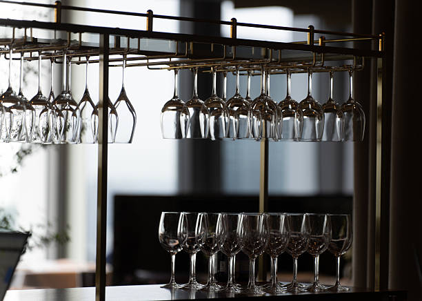 istock Wine glasses at rest in upscale Tokyo bar 2218456041