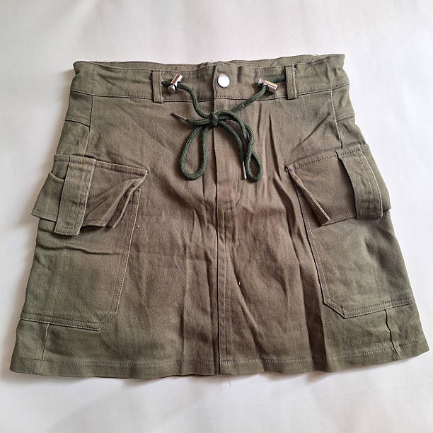 istock Army green skirt with pockets and drawstring front 2218457057