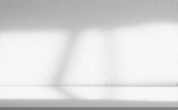 istock Background White Wall Studio With Grey Shadow,Bright Light on Podium for Product Display,Interior wall kitchen with window light on floor concrete.Minimal abstract background with for presentation 2218457359