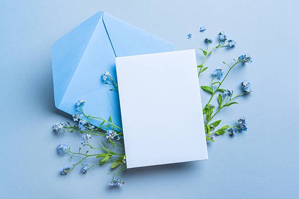 istock Greeting card and envelope design with blue forget-me-not flowers 2218459094