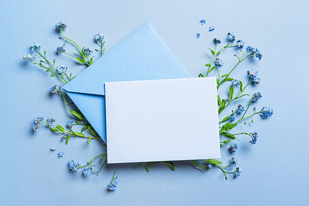istock Greeting card and envelope design with blue forget-me-not flowers 2218459095