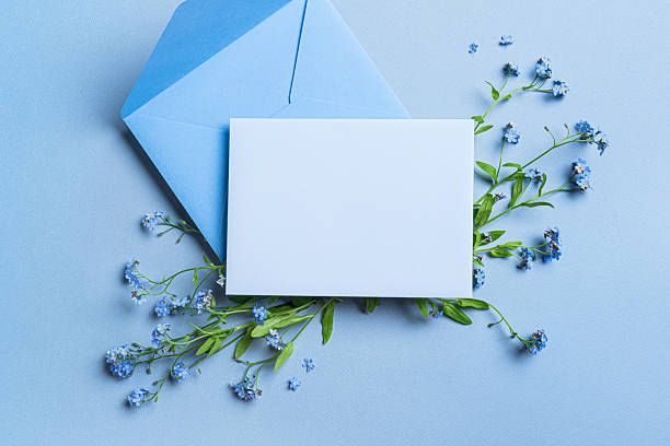 istock Greeting card and envelope design with blue forget-me-not flowers 2218459096