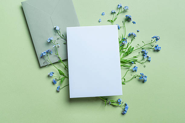 istock Greeting card and envelope design with blue forget-me-not flowers 2218459212