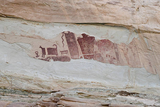 USA New Mexico    Abiquiu village district,  composite image.  cow skull and red rock cliff wall