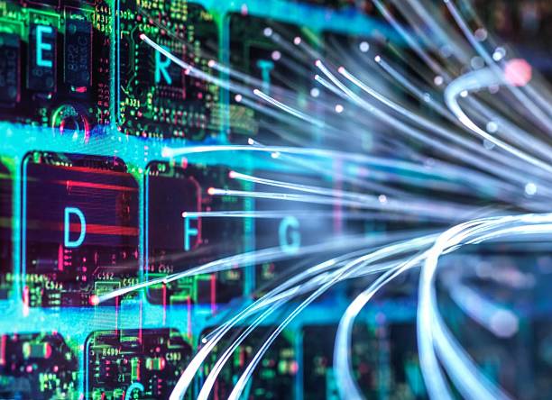 istock Glowing fiber optic cables over a circuit board, representing digital communication. 2218464422
