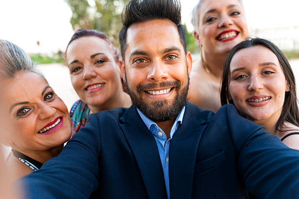 istock Happy business team taking a selfie outdoors smiling at camera 2218465171