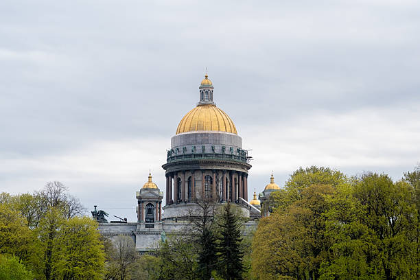istock St. Isaacs Cathedral With Golden Dome Surrounded by Lush Greenery in Overcast Weather 2218468407
