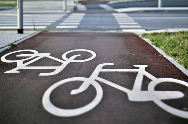 istock Horizontal Markings on Bike Path Showing Bicycles in Both Directions Before Pedestrian Crossing and Bicycle Lane Across Road 2218469606