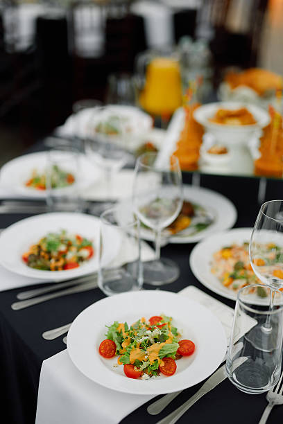 istock Elegant dining setup with beautifully plated salads in refined restaurant atmosphere 2218472749