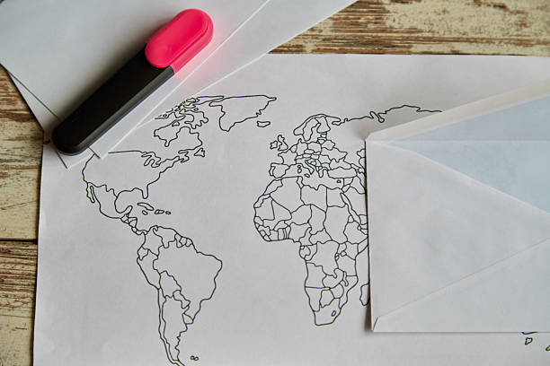notebook with black pen on the table