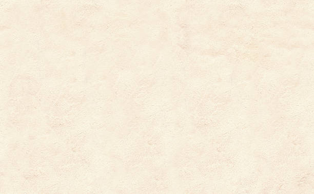 istock Seamless pattern with texture of stucco. Repeatable old stucco wall texture of beige color. Endless texture can be used for tiling pattern fills, web page background 2218475475