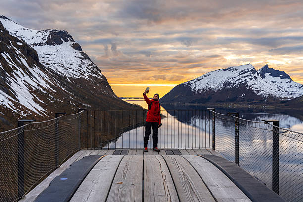 istock Hiker taking selfie with a stunning landscape, Norway 2218477563