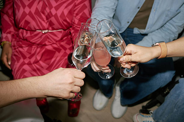 istock Diverse Young Adults Clinking Glasses Celebrating Birthday with Disability 2218478093