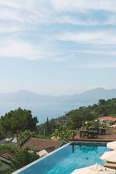 istock A stunning infinity pool merges with endless ocean views at a luxury hotel, creating a serene paradise 2218486328