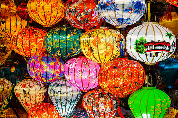 istock Colorful Vietnamese Silk Lanterns Displayed at a Market Stall, Symbolizing Festive Tradition 2218486791