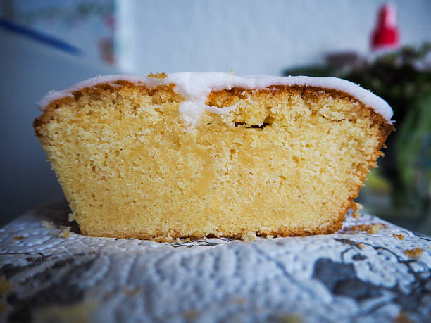 Freshly baked homemade lemon cake with a golden crust and moist texture. A bright, citrusy dessert served simply and authentically