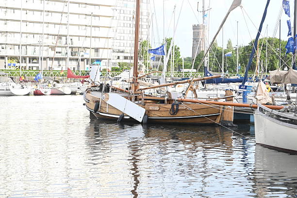 Alignment of sailboats alongside the quay during maritime festival in Brest