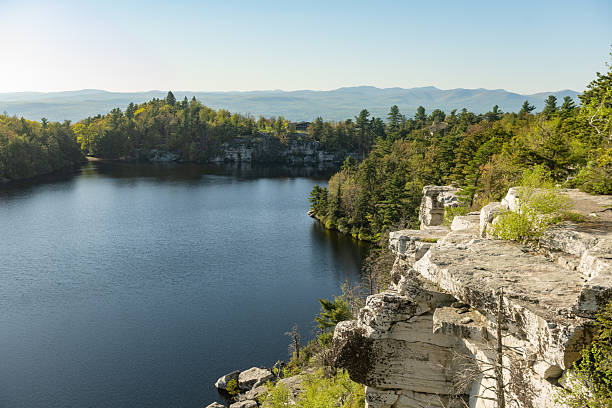 istock Lake Minnewaska Park Landscape with Cliffs and Trees in Spring 2218490626