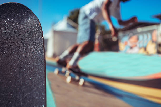 Point Of View Looking Down The Quarter Pipe At A Street Style Skatepark. Stock Photo.