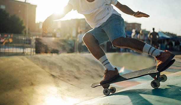 istock Sunset Skateboarding at a waveramp Surfskate Skate Park 2218492302