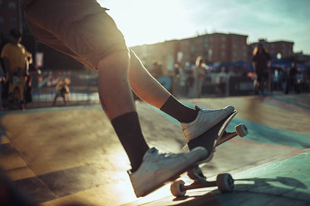 istock Sunset Skateboarding at a waveramp Surfskate Skate Park 2218492304