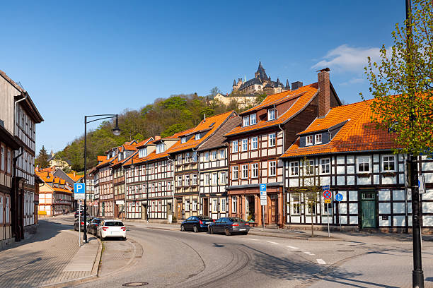Charming corner in Wernigerode with half-timbered houses and castle in the Harz Mountains