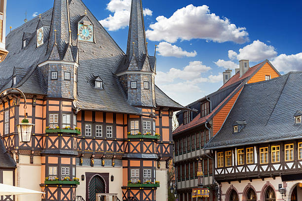 Photograph of the historic Wernigerode Town Hall, a well-known half-timbered building and major tourist attraction in the Harz region of Germany. Captured on a bright day, the image highlights the building’s striking architecture and its role as a central point in the town’s market square. Suitable for themes such as German heritage, medieval architecture, cultural tourism, and historic landmarks in Saxony-Anhalt.