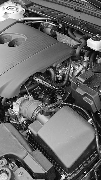 istock Fuel supply system pipes and coolant circulation tubes in the engine compartment around the engine 2218494406