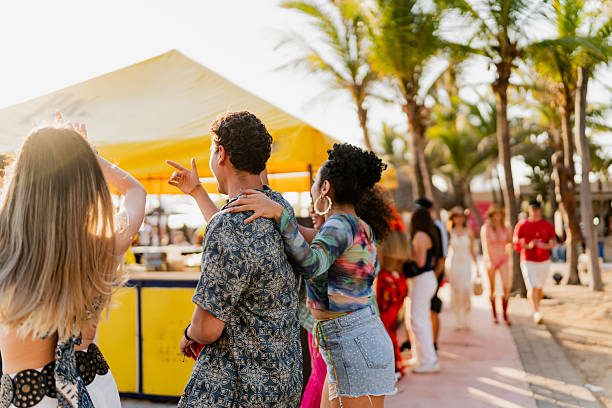 Happy friends celebrating during party outdoors
