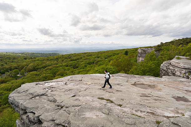 istock Woman hiking at high points 2218500610