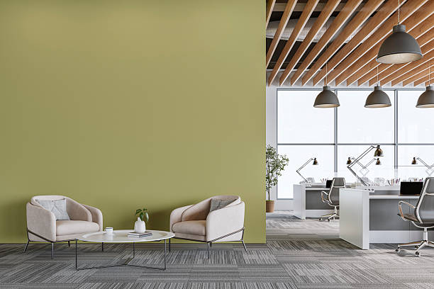Modern Office Interior with an olive green wall and Minimalist Lounge Area