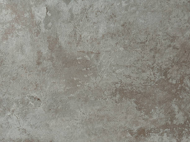 istock Detailed close-up of a grey-brown glazed tile featuring a realistic aged stone or concrete texture with subtle variations and marks, perfect for backgrounds 2218502015
