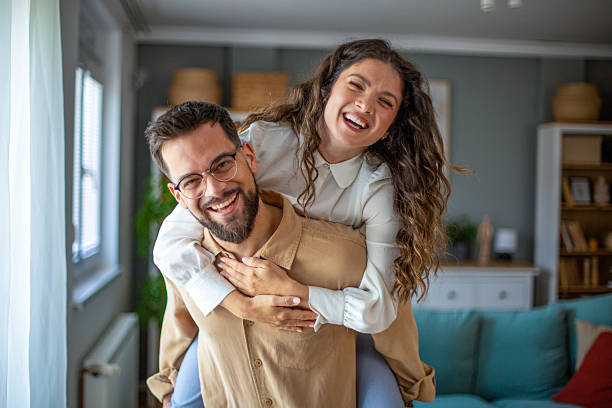 istock Joyful couple enjoying quality time at home 2218502314