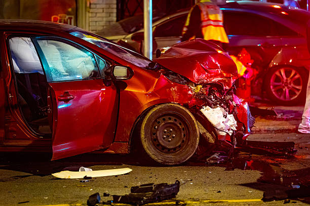istock Severe Two-Car Crash on Street at Night 2218505507