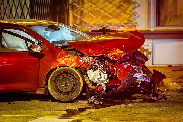istock Severe Two-Car Crash on Street at Night 2218505516
