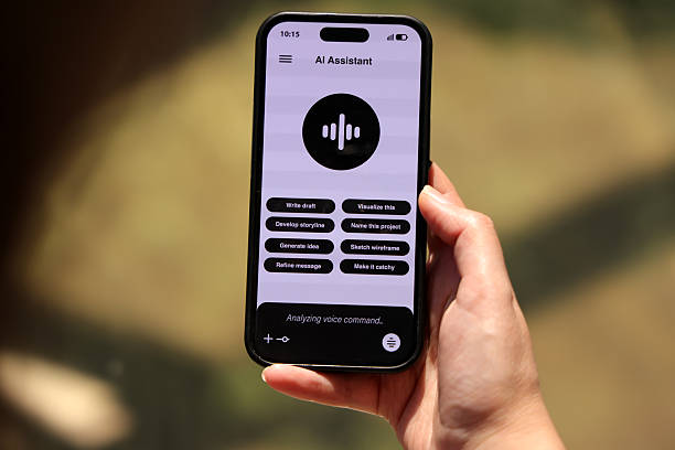 istock AI Assistant App Interface on Smartphone Screen in Hand Outdoors 2218505961
