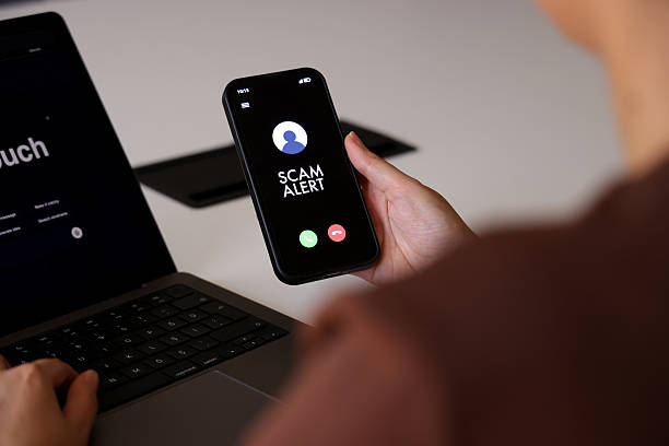 istock Scam Alert Notification on Smartphone Screen During Incoming Call 2218507020