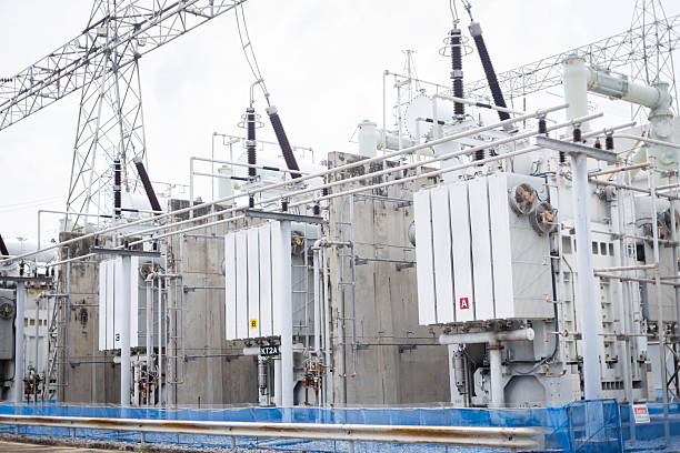 istock Power substation infrastructure with high voltage transformers and electrical equipment in industrial setting ensuring energy distribution and safety 2218509797