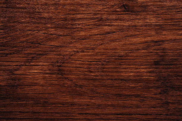istock Warm red-brown wooden surface with rich texture and fine linear grain detail 2218510604