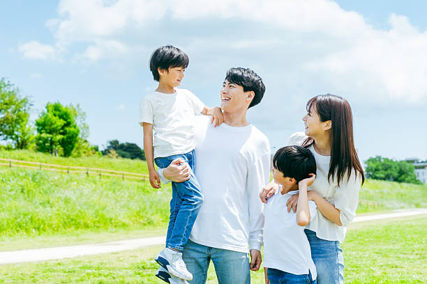istock family playing under the blue sky 2218514183