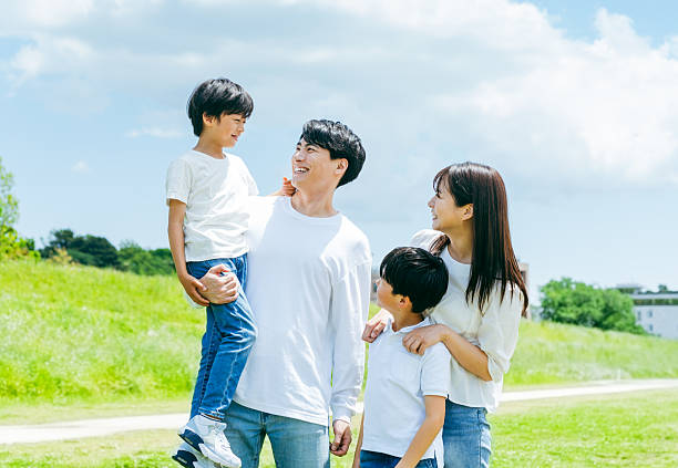 istock family playing under the blue sky 2218514191