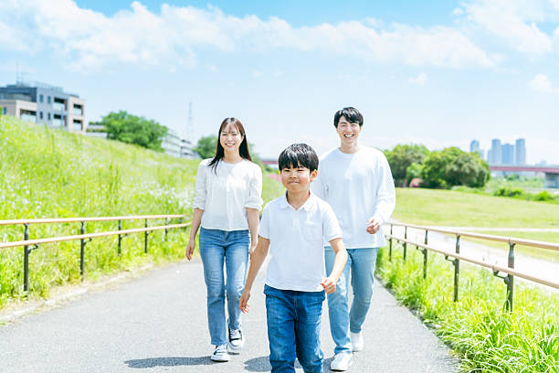 istock family playing under the blue sky 2218514281