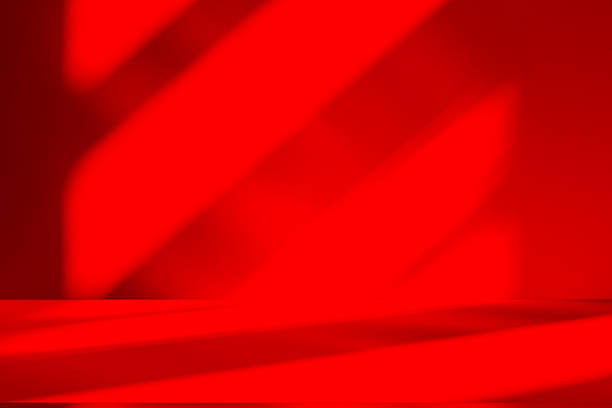 istock Wall interior background, studio and backdrops show products.with shadow from window color red . background for text insertion and presentation product 2218516932