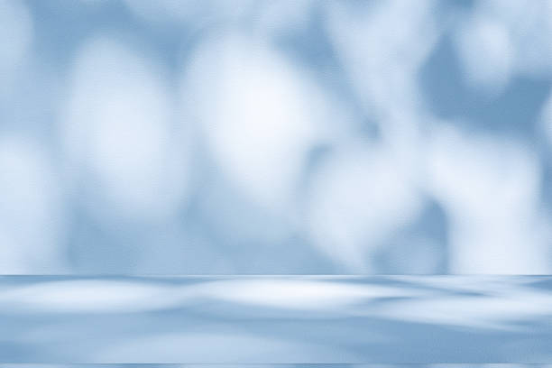 istock Studio style background wall decoration presentation uses white and blue tones. with shadows cast from a nearby window, concept creating a decorative 2218516953