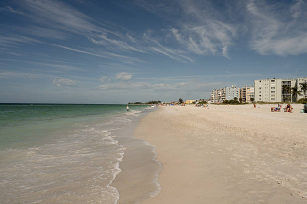 Tourists enjoying their beach vacation at Holmes Beach, Florida in Holmes Beach, Florida, United States