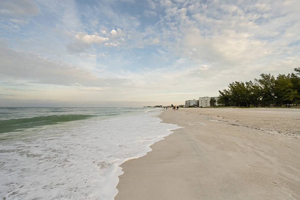 Gentle waves crash the scenic shoreline on Holmes Beach, Florida in Holmes Beach, Florida, United States