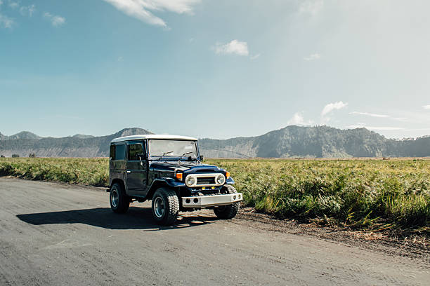 istock Tourists using Off-Road 4x4 Car in Mount Bromo 2218520173