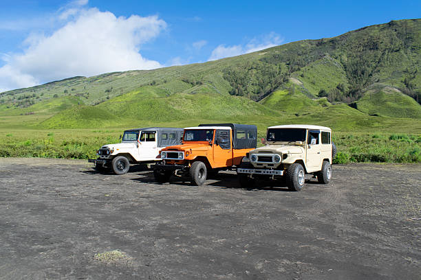 istock Tourists using Off-Road 4x4 Car in Mount Bromo 2218520213