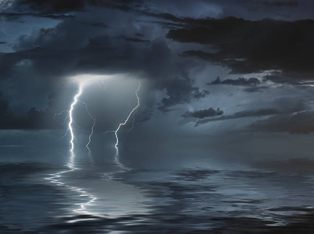 istock lightning bolts reflection over the sea 2218520422